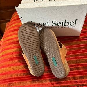 Open toe and back slip on sandals.